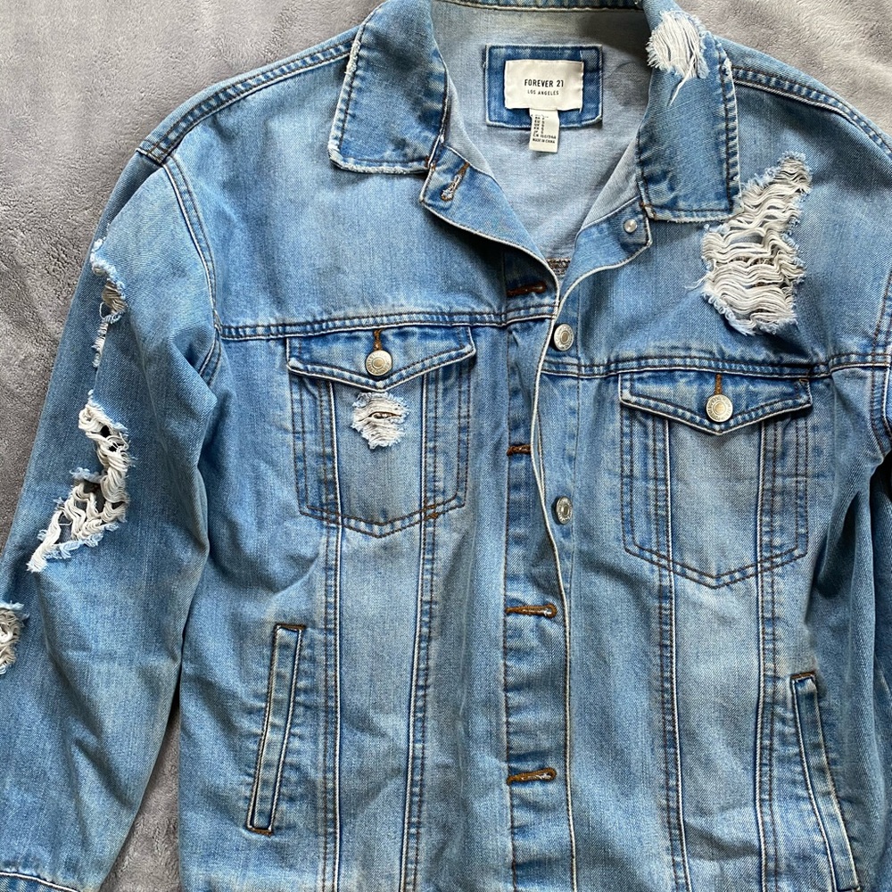 Women’s oversized distressed jean jacket